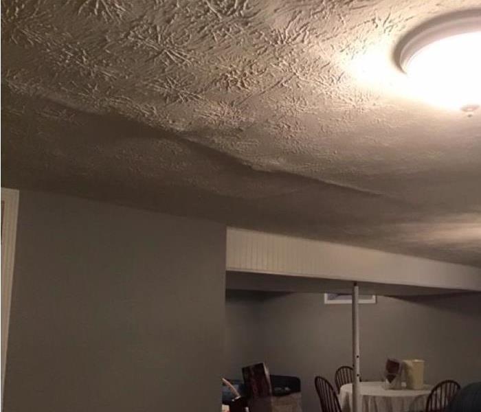 bubbling white ceiling due to water damage