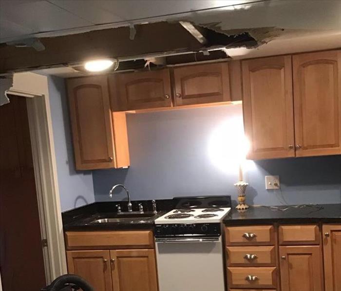 ceiling collapsed with water