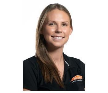 Female employee smiling with white background