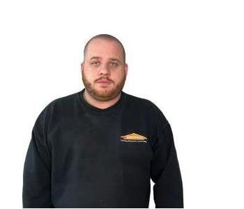 Male Employee smiling with white background