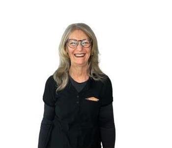 Female employee smiling with white background