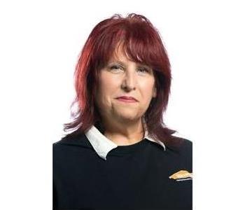 Female employee smiling with white background