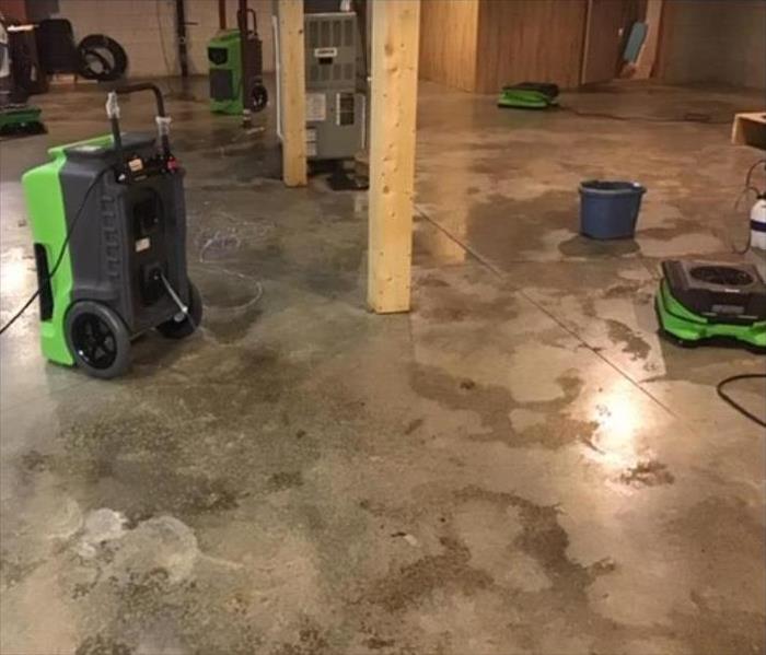 equipment set on concrete floor of basement