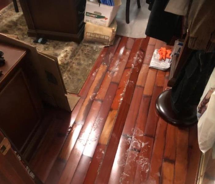 hardwood flooring lifting from water damage