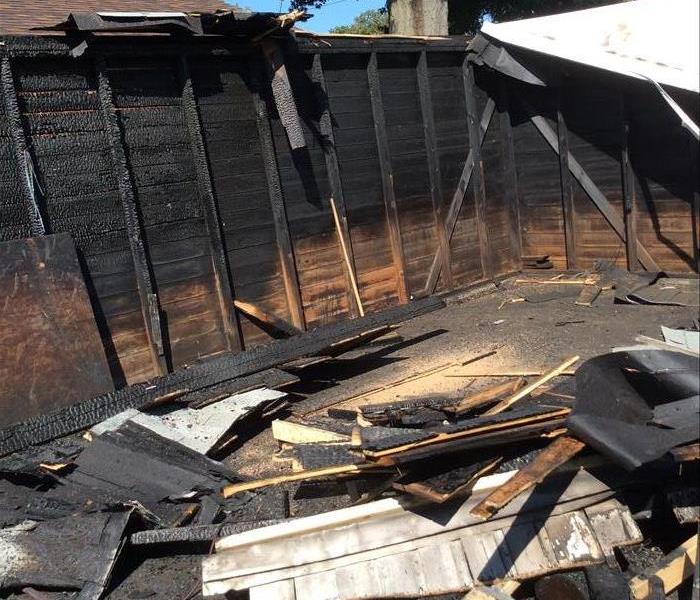 tearing down garage after fire loss