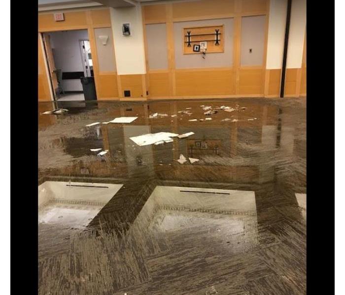 standing water on floor of commercial building
